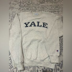 A YALE (Boathouse) light gray with blue embroidering, size small
